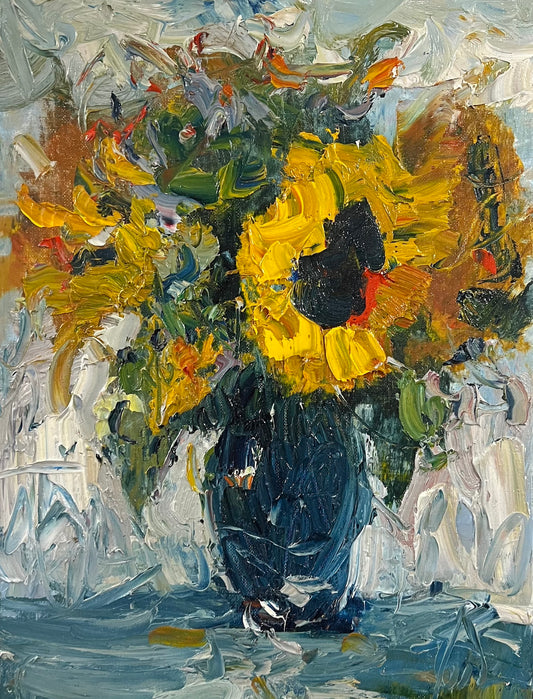 Sunflowers in a Blue Vase